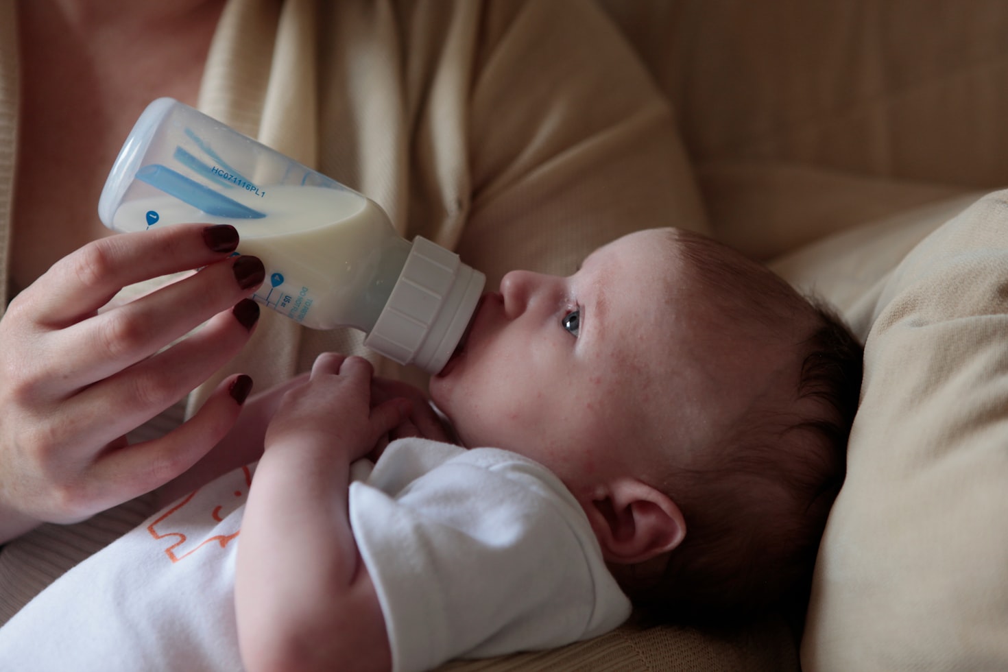 Baby being fed